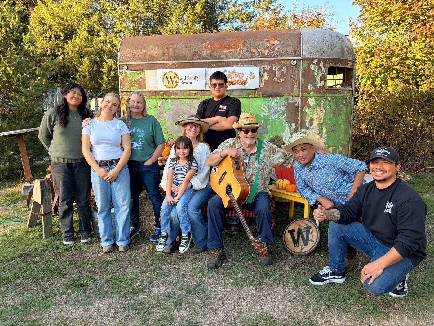 The Ward Family Rescue and Pipsqueaks crew in front of the old horse trailer